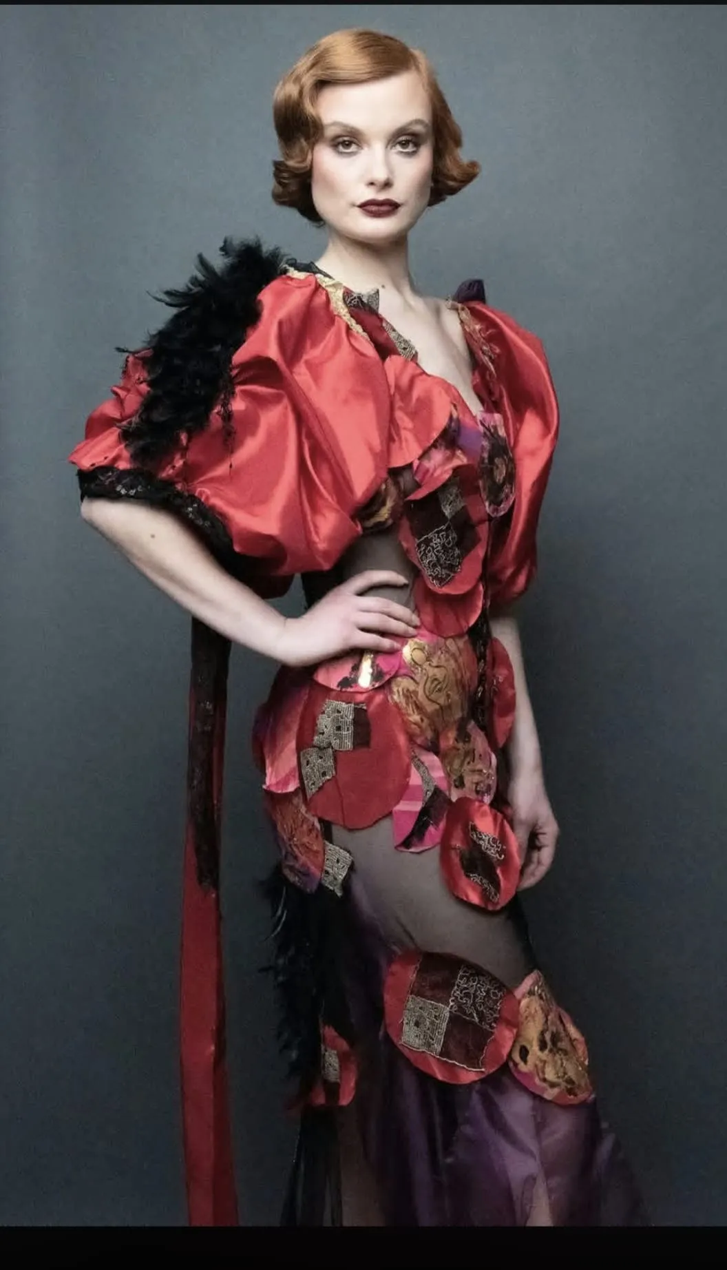 Detail of the red couture gown with hand-painted circles